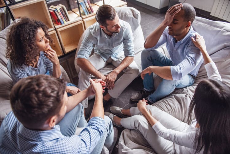 A circle of friends talking.