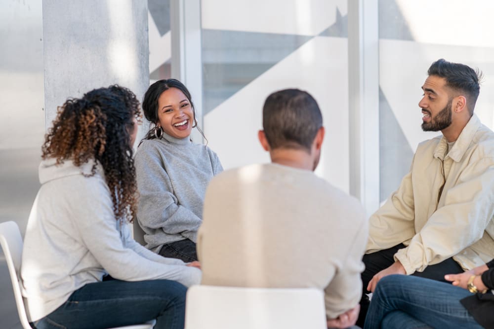 support group of people talking - recovery meetings - addiction recovery - alcoholism recovery