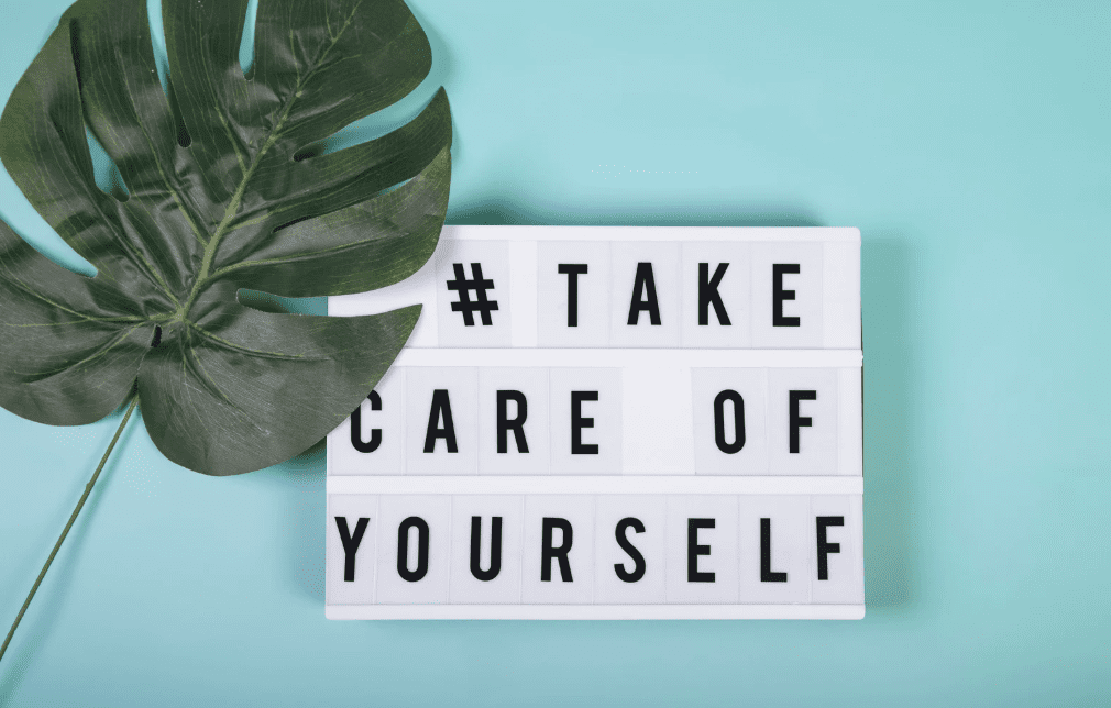A sign that says #TakeCareOfYourself